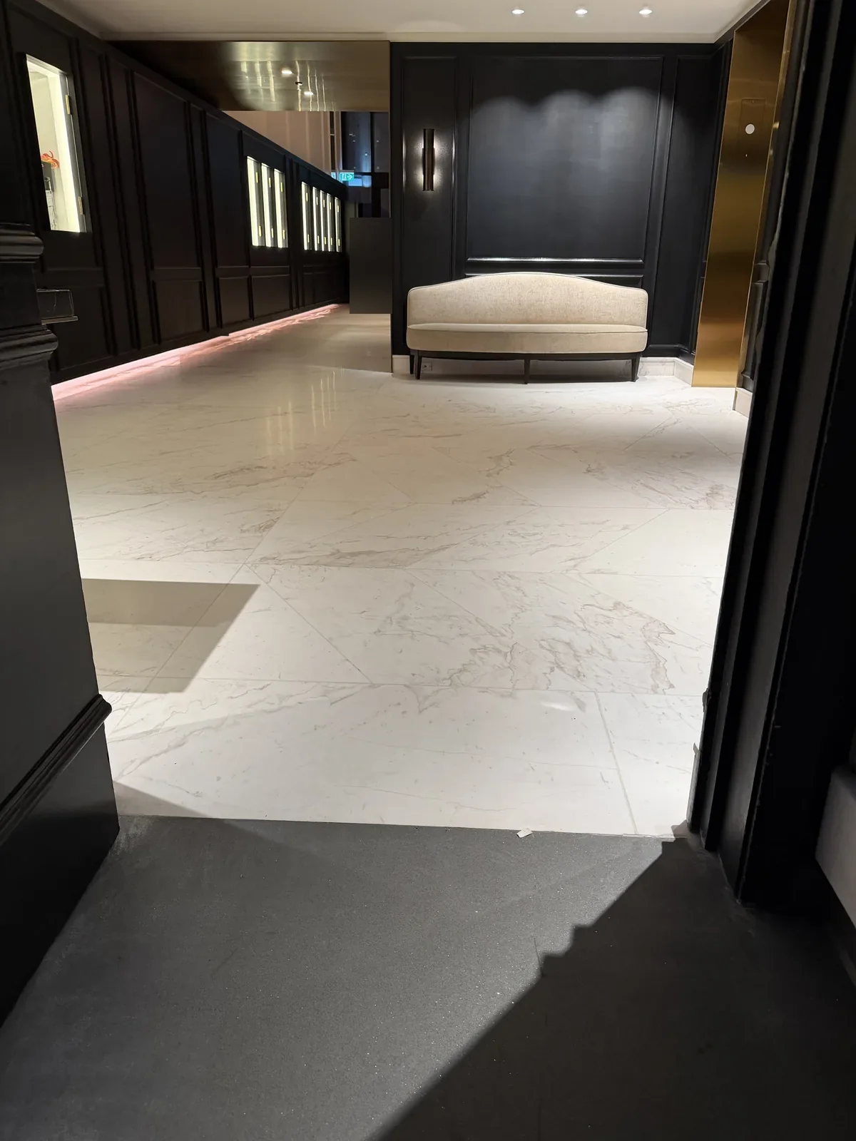 Finished honed marble floor overview at a downtown Montreal hotel