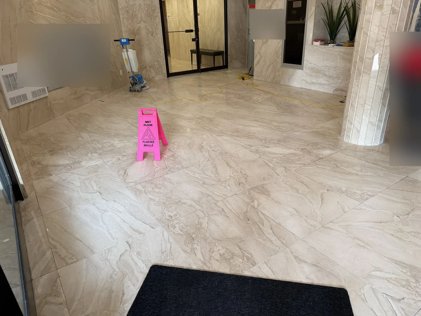 Marble lobby restoration in progress in a Pierrefonds condo