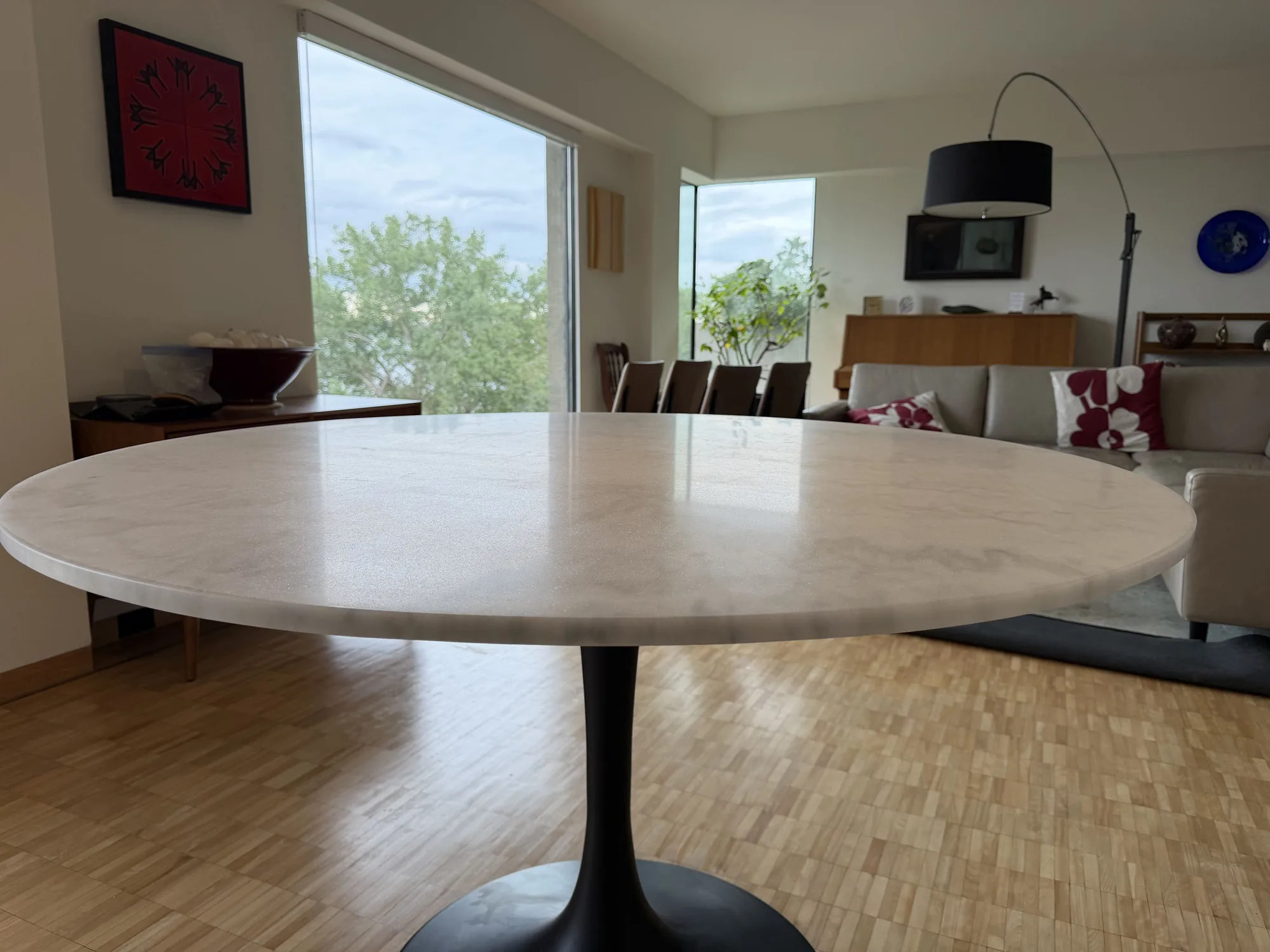 Marble dining table restored to a warm honed finish at Habitat 67 in Montreal