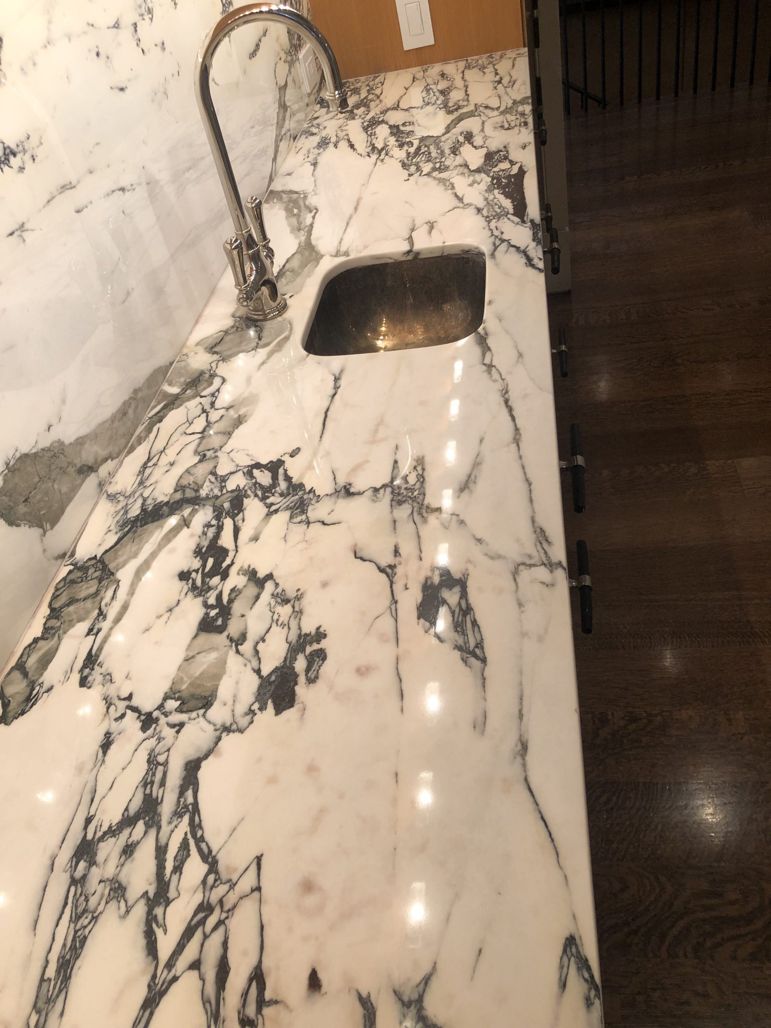 Wine stains lifted from a marble countertop in Westmount — Natural shine restored